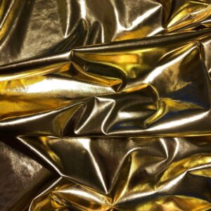 Crinkled gold metallic texture creating a luxurious and vibrant background.